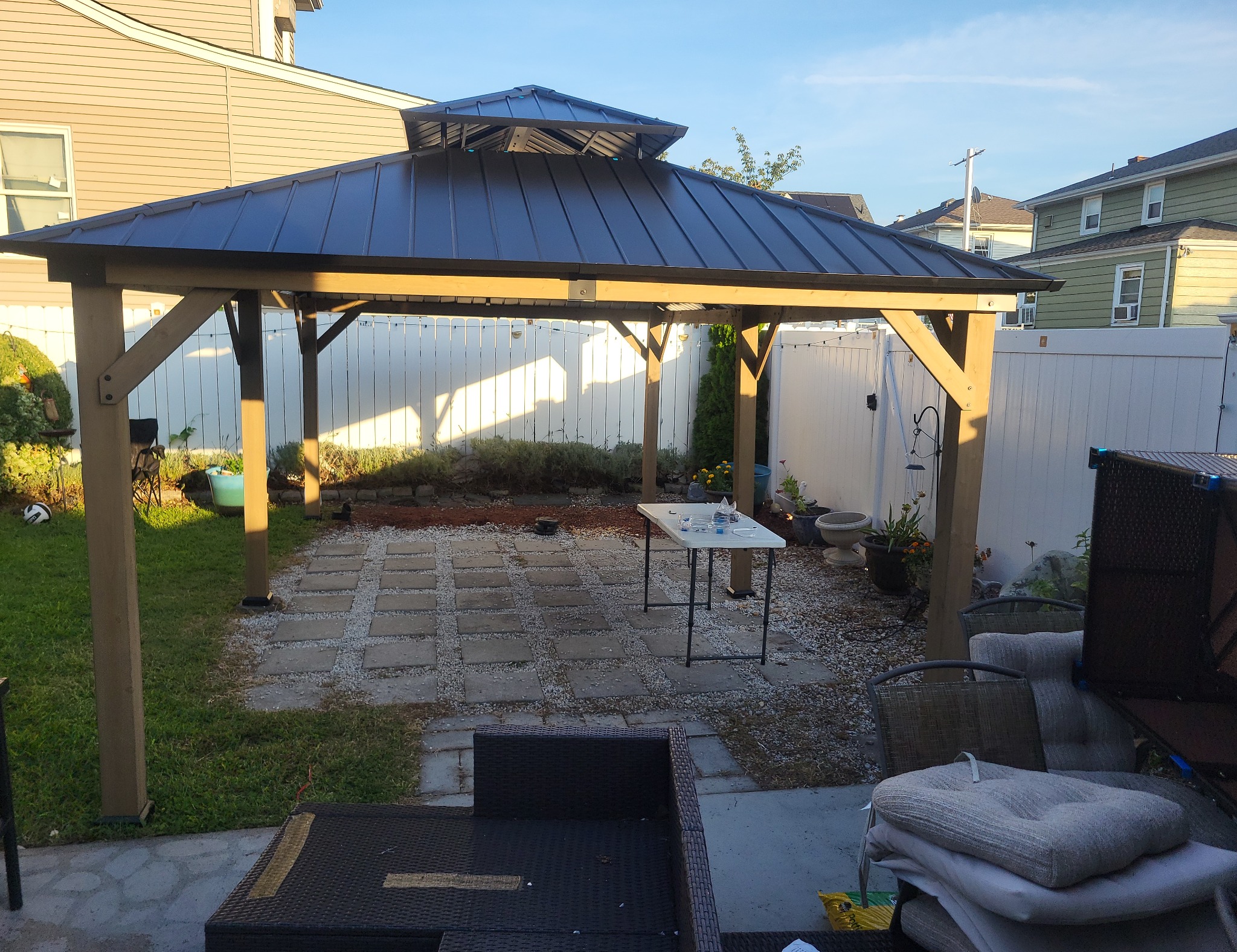 Finished timber gazebo viewed across the patio