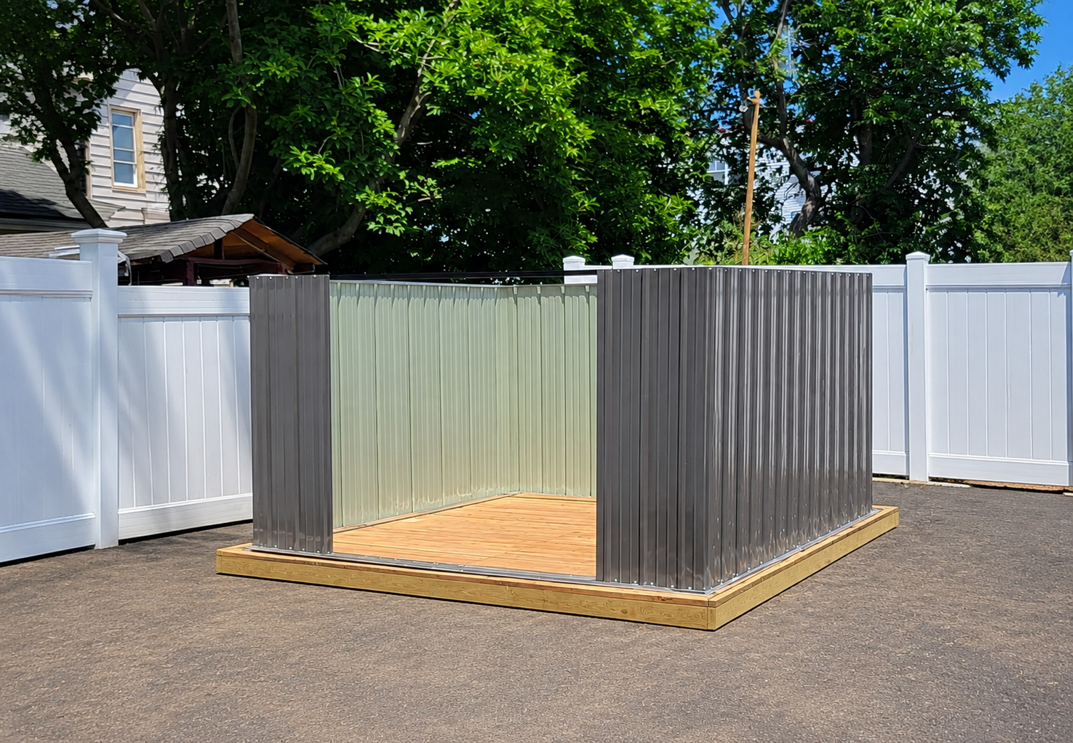 Metal storage shed walls assembled before the roof and doors
