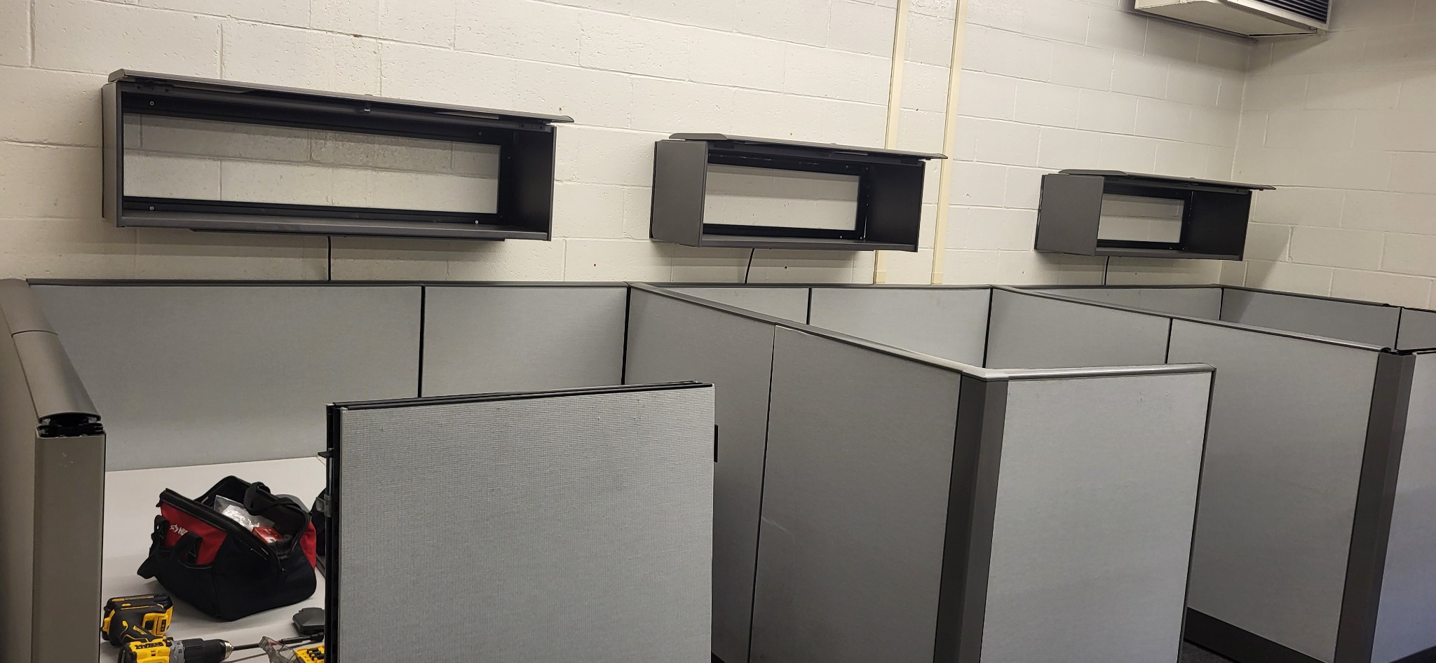 Second view of the original gray cubicle system before disassembly
