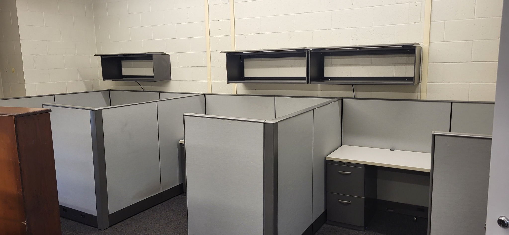 Original gray cubicle layout before disassembly for reupholstery