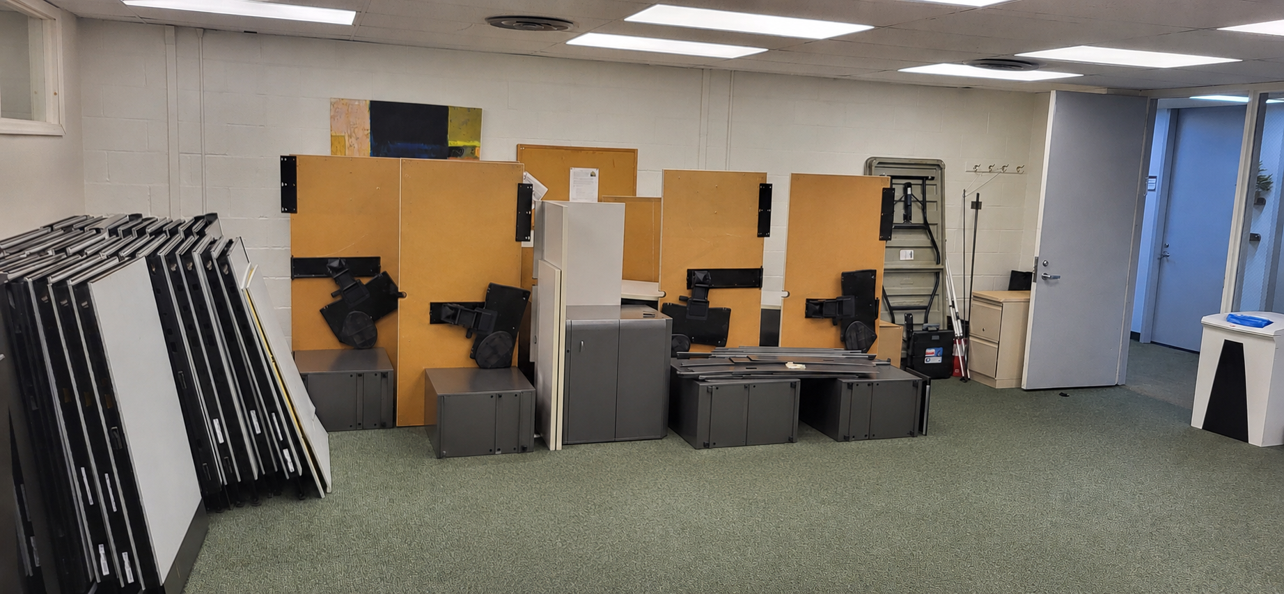 Cubicle components disassembled and staged during the project